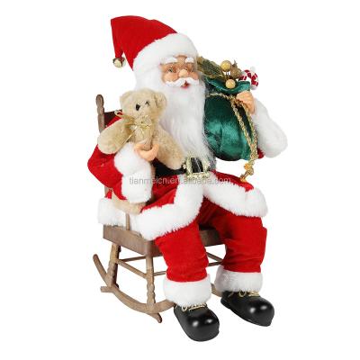 China Custom Cloth 40cm Christmas Plush Animated Electric Santa Claus Rocking Chair Musical Ornament Figurine Christmas Collection for sale