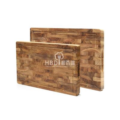 China Disposable Large Teak Wood Cutting Board For Kitchen Set Of 2 Choppers With Hanging Hole for sale