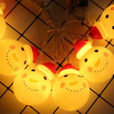 China Cute Warm Cute Snowman Christmas Hat Lights On String Lights Christmas Tree Lights Holiday LED Decorations for sale