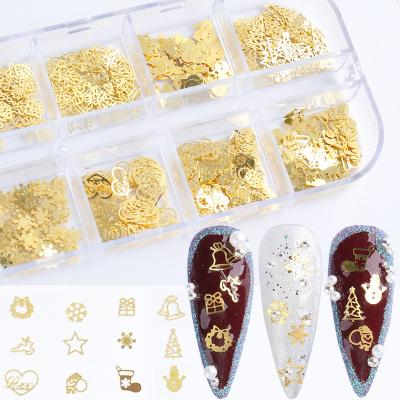 China Nail Art Winter DIY Accessories 3D Gold Hollow Christmas Nail Decoration for sale