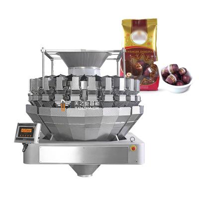 China Automatic Mixed Chocolate Packaging Filling Machine With Capping And Labeling Line Nut Snack Packaging Machine for sale