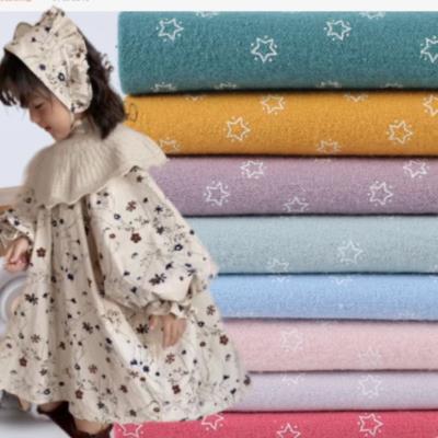 China Printed Flannel Cotton Shirt Fabric Spandex Brush Kids Skirt Autumn Dress Fabric  55SX50S 120GSM for sale