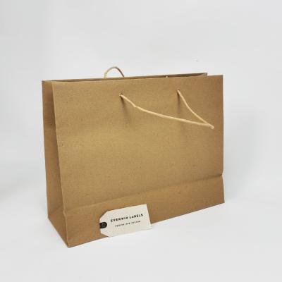 China Recyclable Flat Bottom Folding Brown Custom Paper Gift Packaging Bag For Household Products for sale