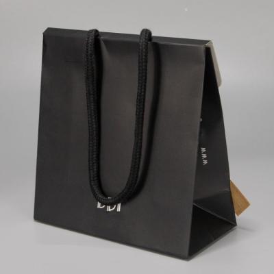 China Custom Logo Ribbon Closure Black Matte Clothing Shoes Shopping Paper Bag Recyclable Luxury Packaging for sale