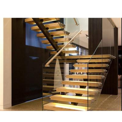 China Stair Tread Steps and Tempered Glass Panel Handrail Modern Indoor Straight Wood Floating Staircase System for sale