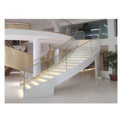 China Modern Luxury Villa Staircase Indoor Tempered Glass Fencing Stairs Modern Curved Steel Staircase for sale