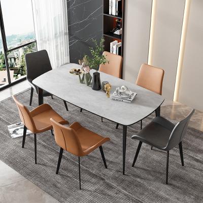 China Modern Dining Table Set Modern Italian Style Simple Stone Dining Table and Rectangular Slate Dining Table Chair Combination for sale