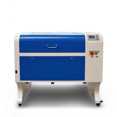 China Paper Water Cooled Acrylic Rubber Cutting Board Printing Machine 1390 Laser Engraving Leather Fabric Felt Advertising Cutting Machine 1325 for sale