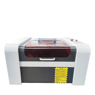 China Water Cooled 4050 Small Laser Engraving Machine Crafts Cheap Easy To Operate Engraving Machine China Laser Machine for sale