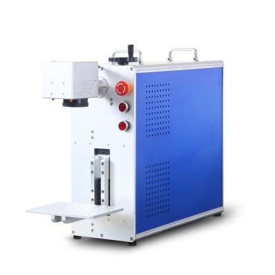 China Portable Laser Marking 20W Laser Marking Machine 30W Fiber Optic Metal Engraving Small Two-Dimensional Code Mask Engraving and Marking Machine for sale