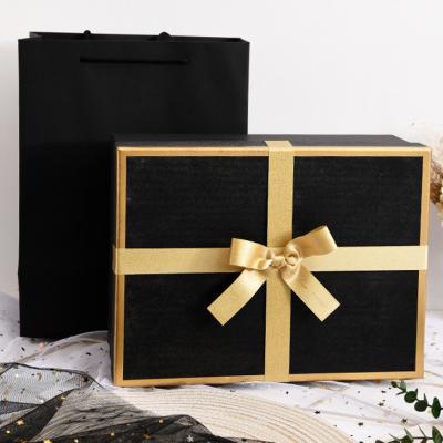 China Large Size Cardboard Cosmetics Gift Paper Box Recycled Luxury Paper Package Materials Christmas Gift Wrapping Box Custom Ribbon Gold Bow for sale