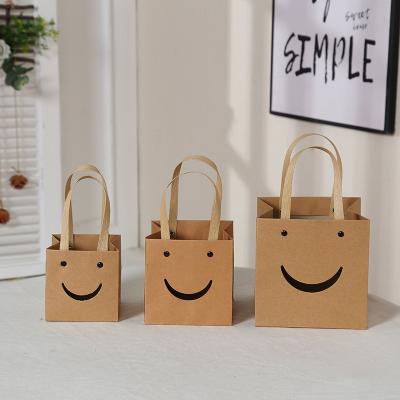 China Recyclable Art Kraft Paper Box Recycled Smiley Bread Flower Square Wide Bottom Bakery Wedding Party Gift Paper Bags with Handles for sale