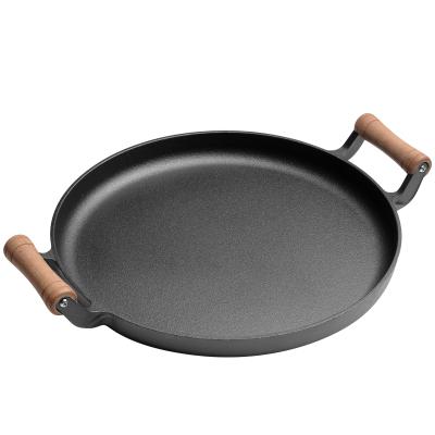 China Sustainable Cast Iron Round Pancake Pan With Wooden Handle Household Pancake Pot for sale