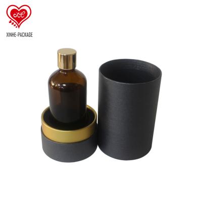 China Handmade Luxury Eco-Friendly Essential Oil Packaging Bottle CustomizedTube Beauty Personal Care Wrapping Paper Glass Round Packaging Box for sale