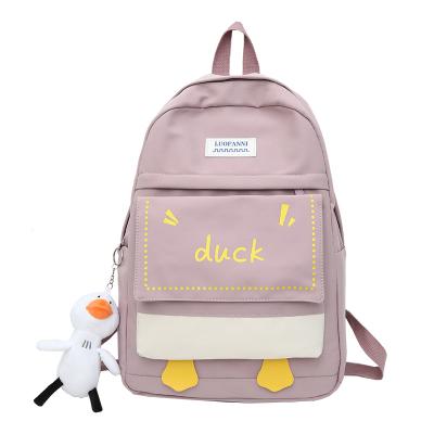 China 2021 new college large capacity woman wholesale China single female pendant backpack cute style anti-theft soft cute schoolbag small for girl for sale