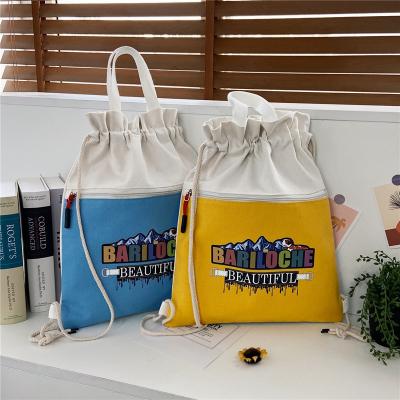 China Anti Theft Canvas Women Shoulder Pocket Student Backpack Crossbody Hand Strap Tote Bag Custom Logo Nylon Drawstring Polyester for sale