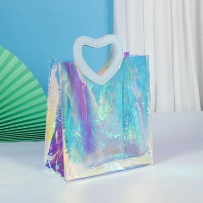 China Clear Plastic Gift Handled Tote Printed Logo Shopping Bag Makeup PVC Colorful Laser Handbag for sale