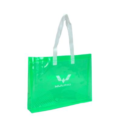 China Laser Promotion Solid Color Clear PVC Handbag Jelly Custom Printed Logo Partner Gift Handled Transparent Shopping Bag for sale