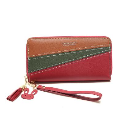 China New Style Anti-theft Ladies Phone Long Zipper Cute Luxury Quilting Tassel Long Women Bag Female Wallet for sale