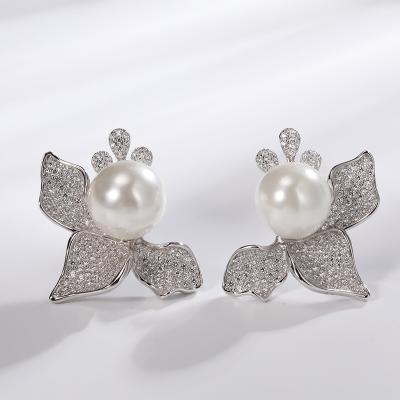 China BOHEMIA S925 Korean Fashionable Silver Flower Bow Earrings Inlaid Pearl Ear Studs Fine Jewelry Wholesale for sale