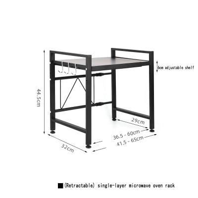 China Hot Selling Kitchen Rack Carbon Steel Adjustable Shelf Workable Storage Rack Telescopic Microwave Oven Shelf Rack For Oven for sale