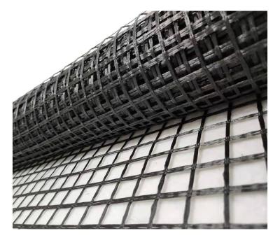 China Hot selling high tensile strength good quality black fiberglass geogrid material with high strength for retaining wall for sale