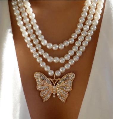 China TRENDY Brand Multilayer Female Big Butterfly Pearl Necklace Lady Fashion Clavicle Chain Pendant Necklace for sale