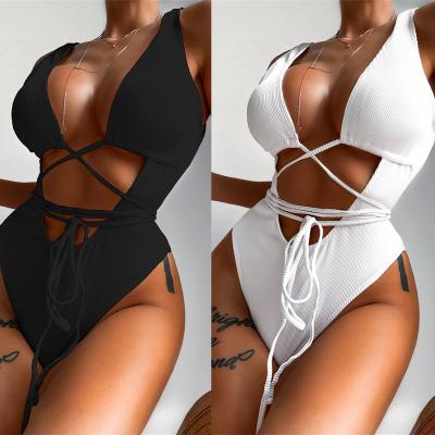 China 2022 Newest Solid Color Breathable Sexy Cavity Lace Up Black White Ribbed One-Piece Swimsuit Ladies Swimwear Women Bathing Suit for sale