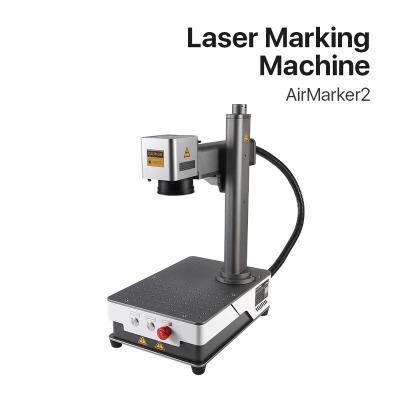 China 20W China Cheapest Portable Automated Fiber Laser Marking Loading Machine with Rotary Complimentary Price Worktable, Rotating Head and Fixture for sale