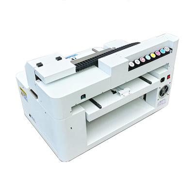 China Factory Printing Focus A1 Height 6040cm UV Flatbed Printer for sale