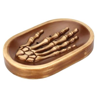 China Hot Selling China Halloween Personality Natural Resin Hand Bone Soap Box Skeleton Soap Holder for sale