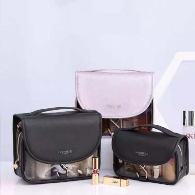 China Durable Luxury PVC Ladies Makeup Pouch Foldable Transparencies Make Up Hanging PU Leather Toiletry Bag Cosmetic Bag for sale