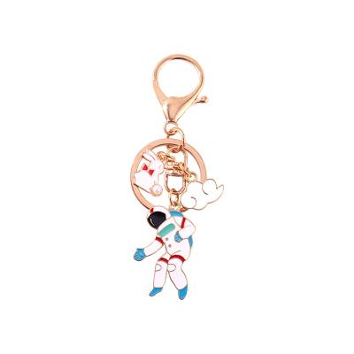 China Popular 2021 Daily Life Metal Key Chains Gold Plating with Rocket Planet and Astronaut Christmas Gifts for Kids for Friends Boys Girls for sale