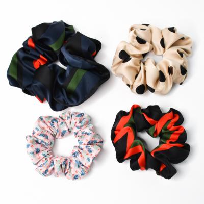 China Sweet New Product Customized Hair Tie For Women Hair Accessories Printed Spot Hair Scrunchies for sale