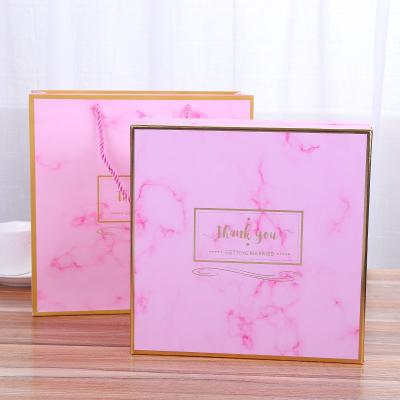 China Creative New Materials Pink Net Recycled Red Marble Party Supplies Packaging Gift Candy Box Handbag Paper Box for sale