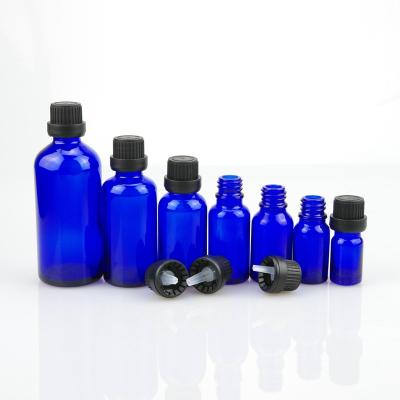 China 18/415 Black Plastic Cosmetic Tamper Evident Screw Cap For Blue Essential Oil Round Glass Bottle for sale