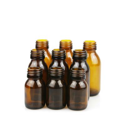 China Medical Use 28mm Cosmetic Wholesale Plastic Tamper Evident Screw Cap For 30ml 60ml 100ml Amber Empty Oral Liquid Bottle for sale