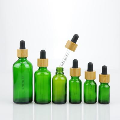 China 5ml 10ml 15ml 20ml 30ml 50ml 100ml Cosmetic HOT Green Essential Oil Dropper Bottle w/18mm Glass Dropper Cap for sale