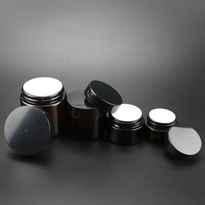 China NEW 20ml 30ml 50ml 100ml amber cosmetic cream glass jar of child safety glass jar with hand fitting screw cap for sale