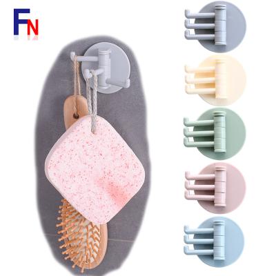 China 3-Layer Rotating Adhesive Wall Hook Bathroom Bedroom Wall Hook Minimalist ABS Multi-Function Wall Hook for sale