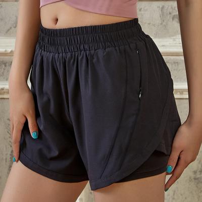 China 2021 New Breathable Sports Shorts With Zipper Pocket Elastic Volleyball Shorts Woman Sports Pants for sale