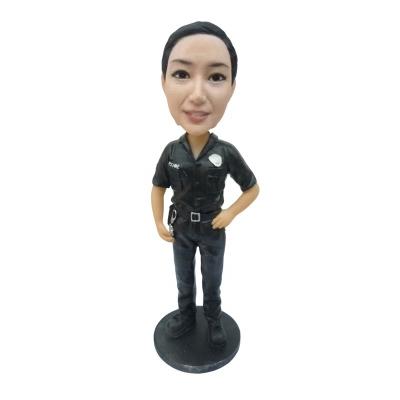 China U. S.A Resin Women Police Figure Standing Shake Head for sale