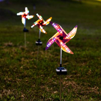 China 2021 WindmillSolar Waterproof Outdoor Led Light Decorative Multicolor Changing Stake Windmill Solar Lawn Garden Light for sale