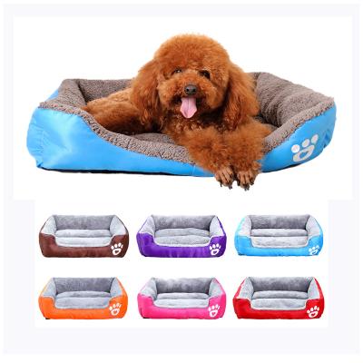 China Lovely Custom Pet Travel Candy Color Pet Bed Warm And Comfortable Semi-enclosed Bed for sale