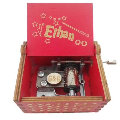 China Make Music Gift Crank Harry Potter Music Box Wood Toys For Children Logo Engrave for sale