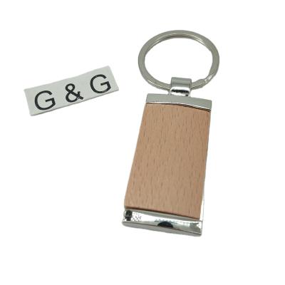 China Wood Decoration Custom Design Wood Laser Engraved Logo Wood Blank Keychain Name Key Tag for sale