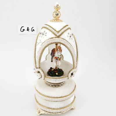 China Funny Gift Carousel Goose Egg Music Box Love Box For Home Decoration Gift for sale