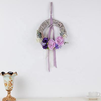 China Latest Design Eco-friendly Window Door Decoration Dried Silk Purple Rattan Peony Wreath for sale