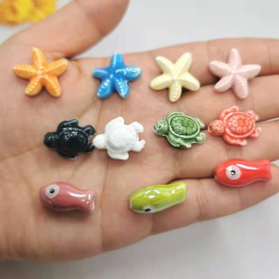 China Ceramic wholesale turtles, starfish, fish mix color ceramic beads for jewelry making for sale