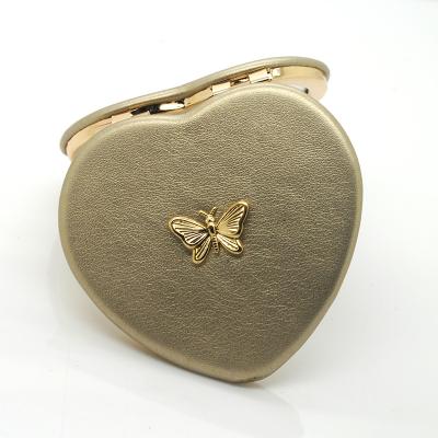 China High Quality Magnifying Cosmetic Mirrors Heart Shape Butterfly Hand Mirror Folded for sale